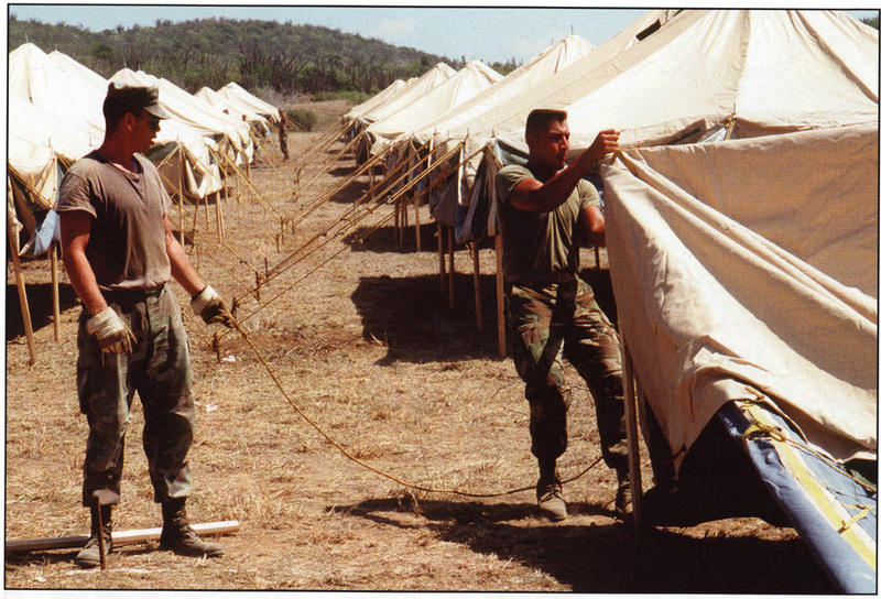 U.S. Marines prepare for the arrival of Cuban rafters at Guantanamo