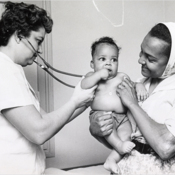 A Cuban child gets a checkup in the Medical Dispensary of the Cuban Refugee Center