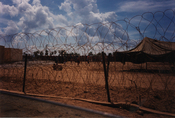 Cuban rafters&#039; camp surrounded by concertina wire, 1990s